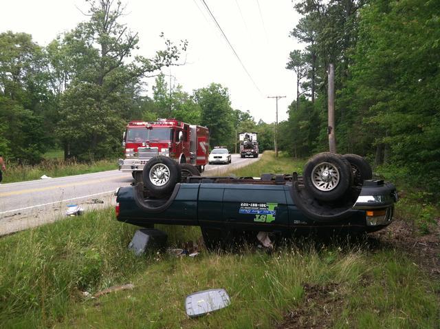 Rescue Engine 22 on the scene of a rollover accident off of Mechanicsville Road 